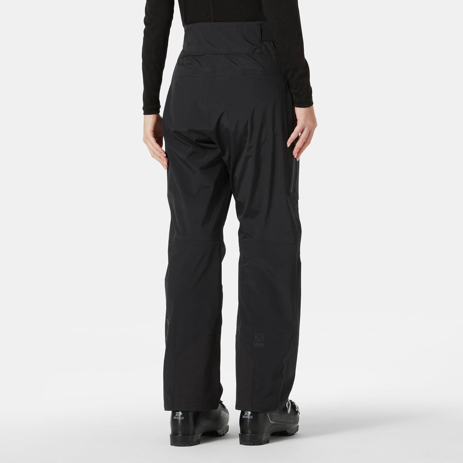 imageHellyHansen Sogn Shell Pant Womens High Waist Adjustable Snow Pant Waterproof Skiing Pants with Cargo Pockets990 Black