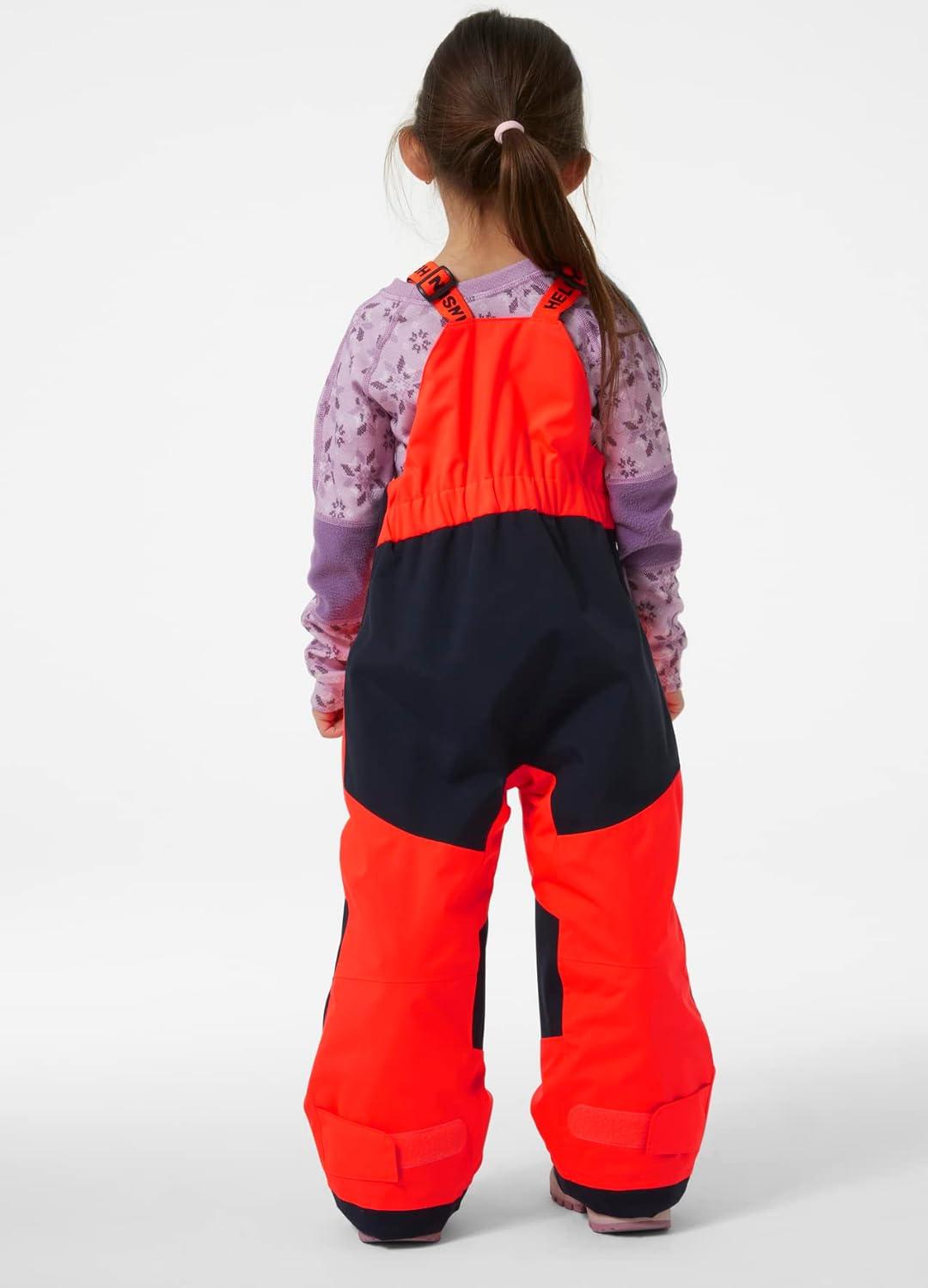 imageHellyHansen Stellar Bib Pant Junior Girls Snow Pants for Winter Activities Waterproof Breathable Durable Ski Gear247 Neon Coral
