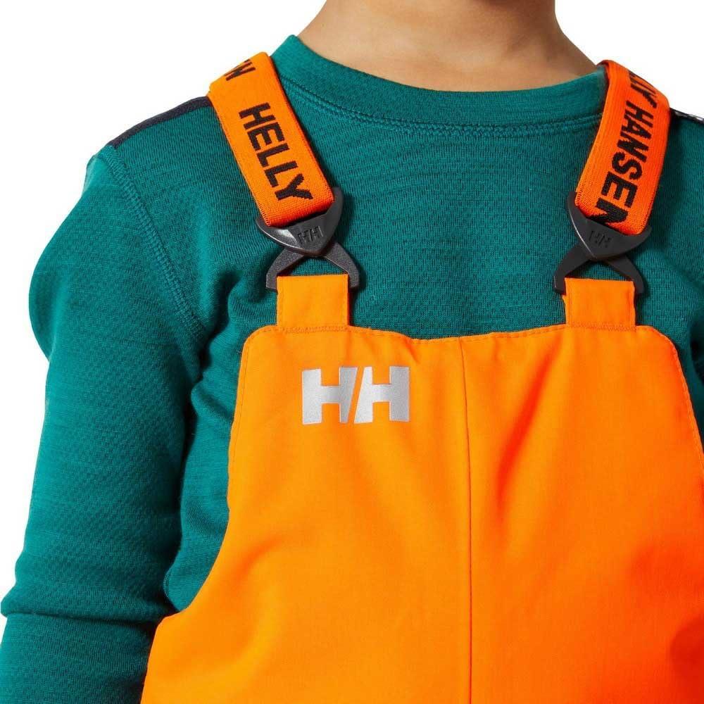 imageHellyHansen Stellar Bib Pant Junior Girls Snow Pants for Winter Activities Waterproof Breathable Durable Ski Gear280 Neon Orange