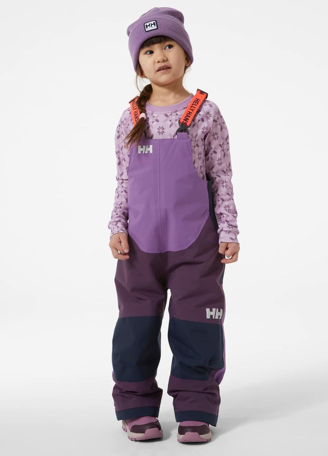 imageHellyHansen Stellar Bib Pant Junior Girls Snow Pants for Winter Activities Waterproof Breathable Durable Ski Gear670 Amethyst